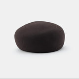 Black beret on a white background