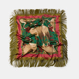 Decorative throw pillow with animal design on a white background