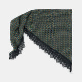 Scarf with geometric pattern and lace trim on a white background