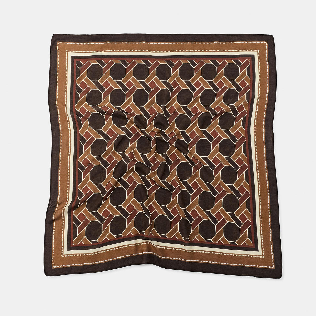 A square patterned scarf with a geometric interlocking circle design in brown, beige, and black, finished with a wide brown border, laid flat on a light gray background.