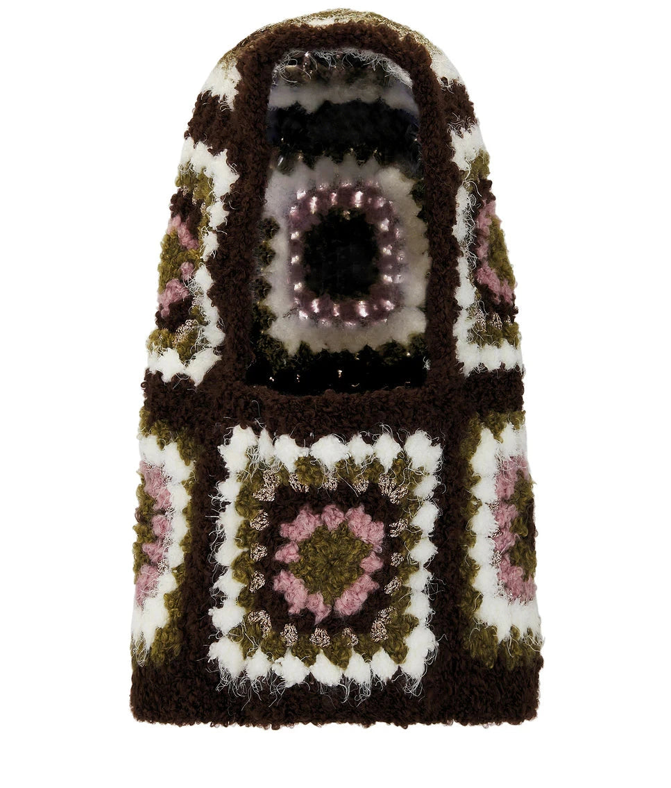Crocheted phone case with a square pattern on a white background
